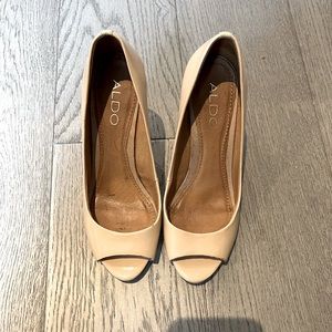 Nude wedge sandal with peep toe. They are US size 7 but run half size smaller.